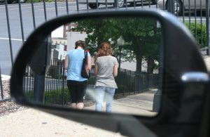 Jackie Stollar and Lila Rose approach a clinic.